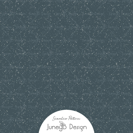 Distressed speckled texture seamless pattern with white paint flecks on dusty blue background.