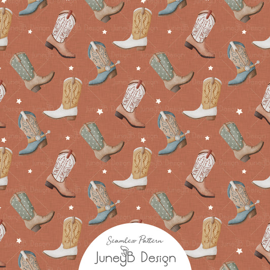 Watercolor cowboy boots seamless pattern with white stars on a rust orange textured background in tan, blue, and sage green tones.