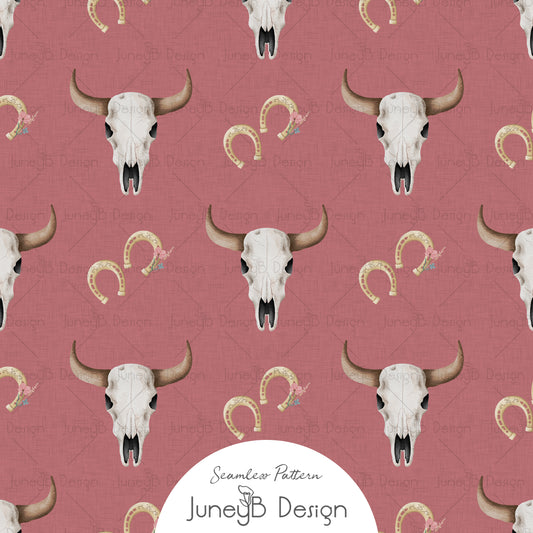 Western longhorn skull and horseshoe seamless pattern with blush florals on dusty pink background digital fabric design.